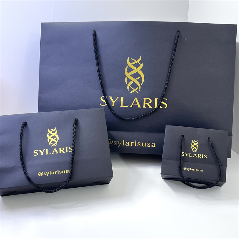 Navy Paper Bag with Gold Foil Logo and Rope Handles