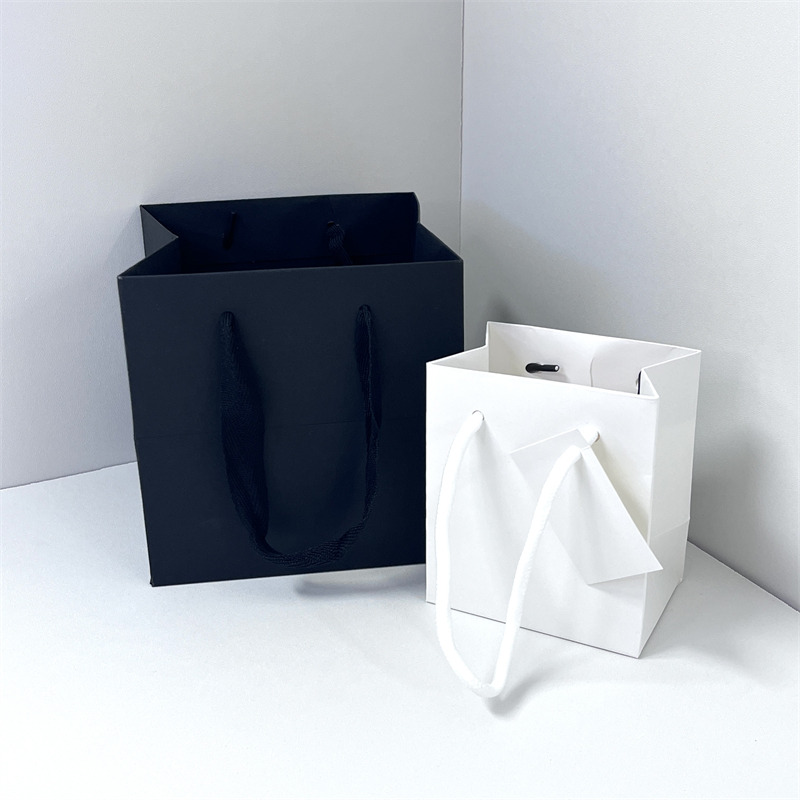 Matte Black and White Paper Bags with Ribbon Handles